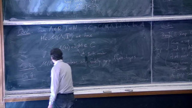 Minimal hypersurfaces with bounded index and bounded area