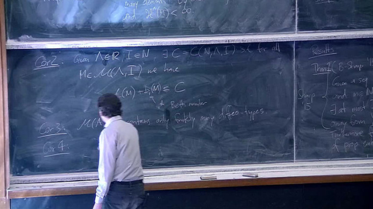 Minimal hypersurfaces with bounded index and bounded area