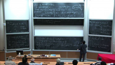 Quantum symmetry of conformal blocks andrepresentations of braid groups at roots of unity