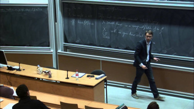 Kähler-Einstein metrics on group compactifications