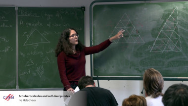 Schubert calculus and self-dual puzzles