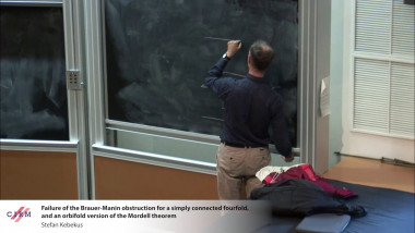 Failure of the Brauer-Manin obstruction for a simply connected fourfold, and an orbifold version of the Mordell theorem