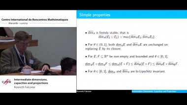 Intermediate dimensions, capacities and projections