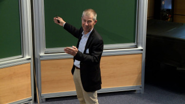 Ultrarelativistic Limit of Gravity, Spacelike Singularities and E(10)