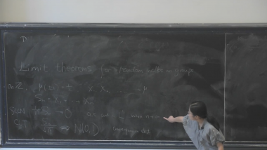Limit theorems for some long range random walks on nilpotent groups
