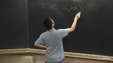 Local rigidity of higher rank lattice actions on flag manifolds - Part 1