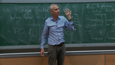 Perverse schobers on surfaces via Ran categories