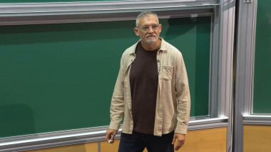 Locality, higher symmetries, and anomalies: an operator-algebraic approach