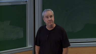Toponogov's theorem and improved Kakeya-Nikodym estimates for eigenfunctions on manifolds of nonpositive curvature