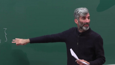 What does perturbative field theory teaches us on the statistical properties of Monge-Kantorovich Optimal Transportation in dimension 2?