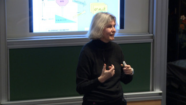 On the geometry of the adele class space of Q