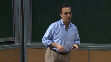 Quasi - periodic standing wave solutions of gravity-capillary water waves