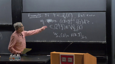 Modular Symbols, K-theory, and Eisenstein Cohomology