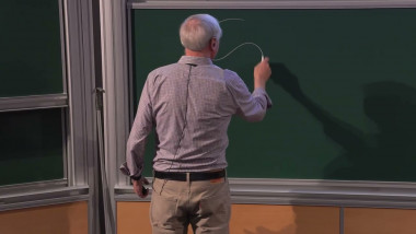 Minimal Surfaces Defined by Extremal Eigenvalue Problems