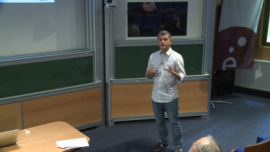 Equivariant wave maps on a class of rotationally symmetric manifolds
