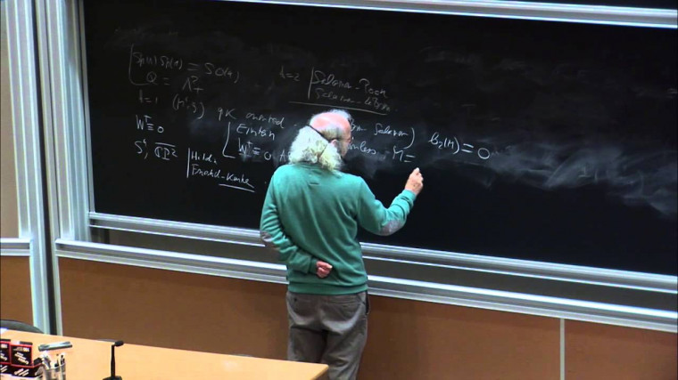 Almost complex structures on quaternion-Kähler manifolds of positive type