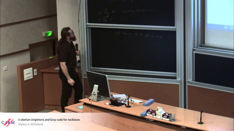 $k$-abelian singletons and Gray codes for Necklaces