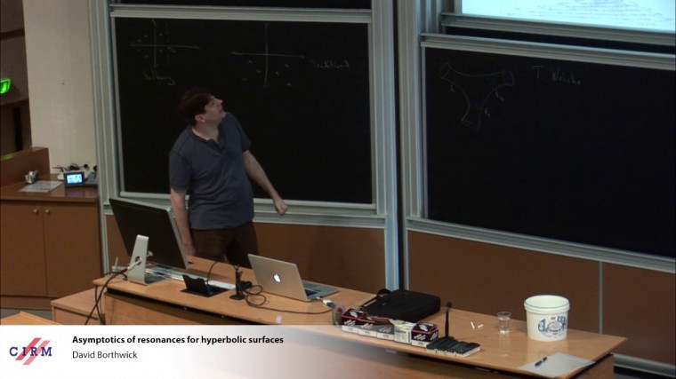 Asymptotics of resonances for hyperbolic surfaces