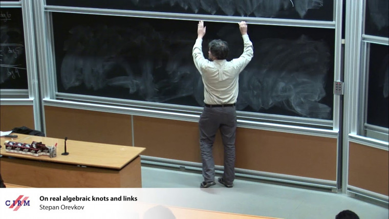 On real algebraic knots and links