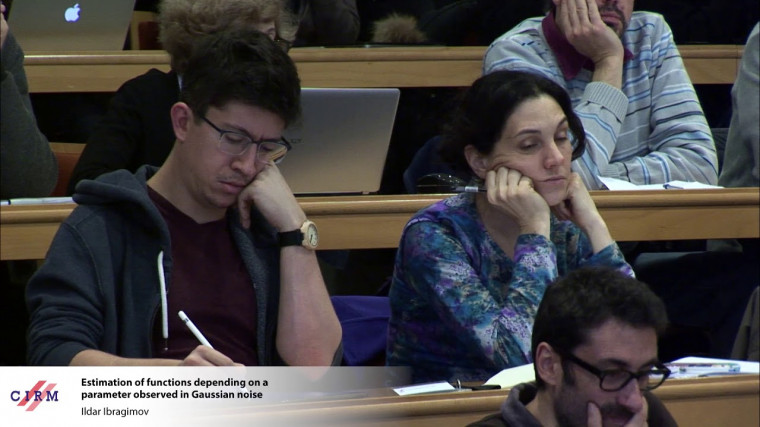 Estimation of functions depending on a parameter observed in Gaussian noise