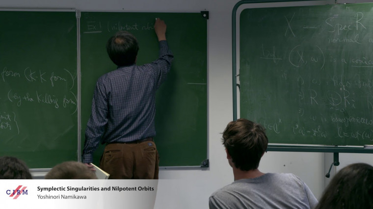 Symplectic singularities and nilpotent orbits