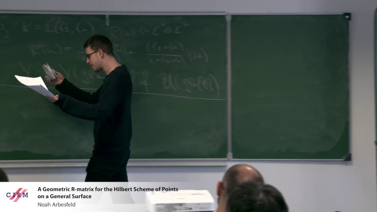 A geometric $R$-matrix for the Hilbert scheme of points on a general surface