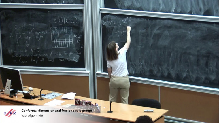 Conformal dimension and free by cyclic groups