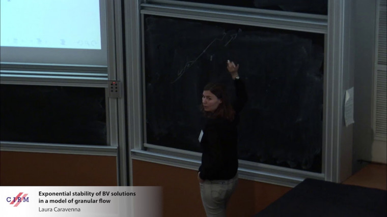 Exponential stability of BV solutions in a model of granular flow