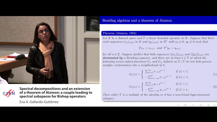 Spectral decompositions and an extension of a theorem of Atzmon: a couple leading to spectral subspaces for Bishop operators