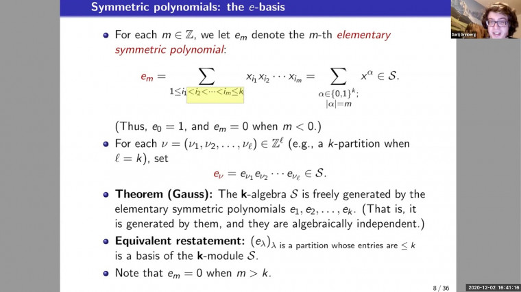 Quotients of Symmetric Polynomial Rings Deforming the Cohomology of the Grassmannian