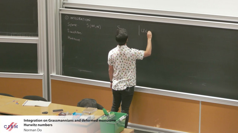 Integration on Grassmannians and deformed monotone Hurwitz numbers