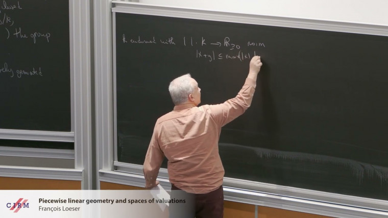 Piecewise linear geometry and spaces of valuations