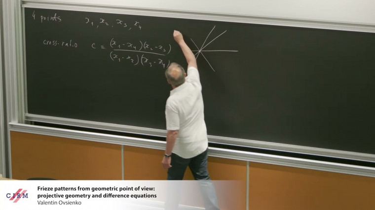 Frieze patterns from a geometric point of view: projective geometry and difference equations