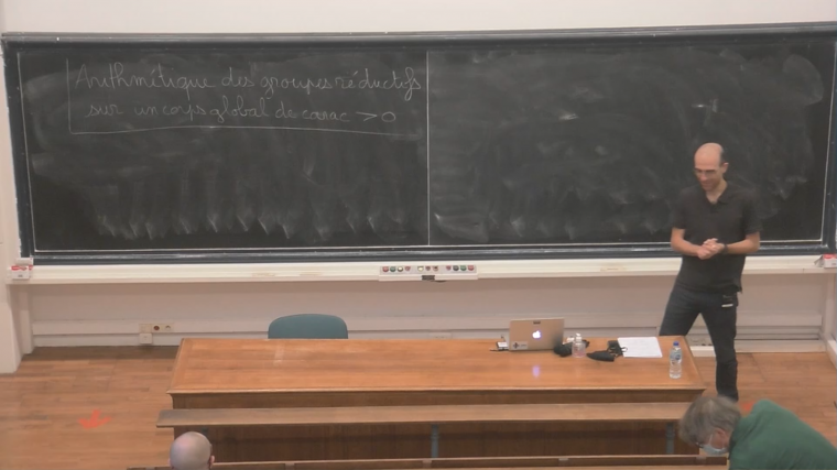 Arithmétique des groupes réductifs sur les corps globaux de caractéristique positive