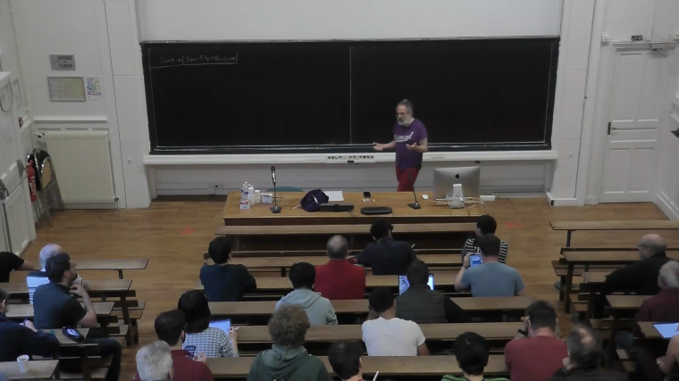 Finiteness of totally geodesic hypersurfaces in variable negative curvature