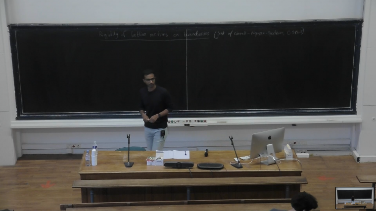 Rigidity of lattice actions on boundaries