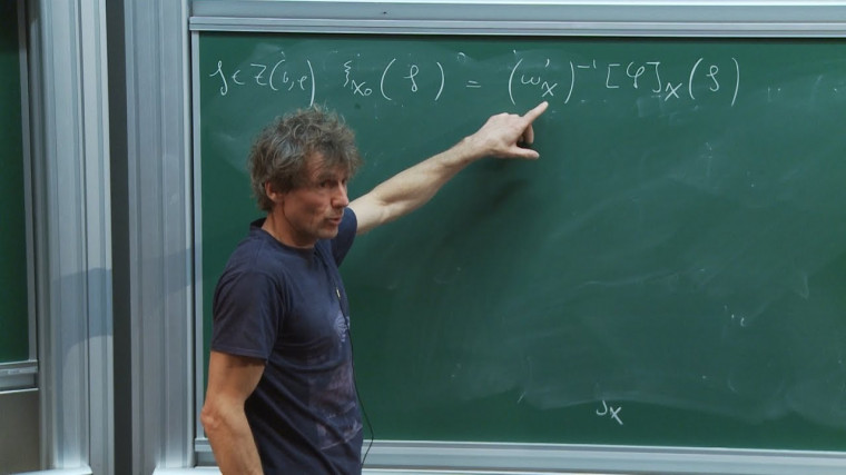 Transfert géométrique et blocs de Bernstein des séries principales de niveau zéro