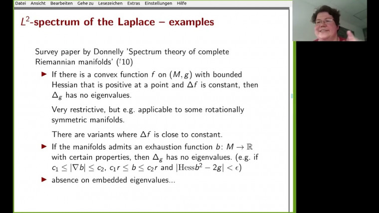 On spectra of Laplace and Dirac operators on noncompact manifolds