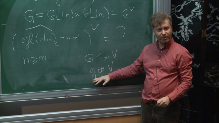 Local geometric Langlands correspondence and Lie superalgebras