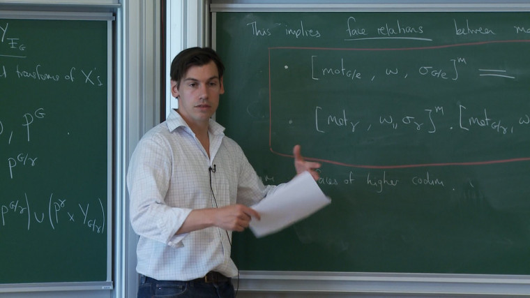 4/4 Motivic periods and the cosmic Galois group