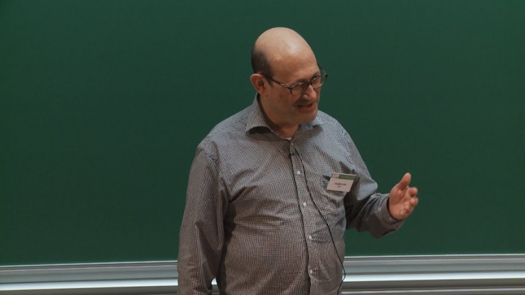 Spreading-out for families of rigid analytic spaces (joint work with Brian Conrad)