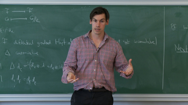 3/4 Motivic periods and the cosmic Galois group