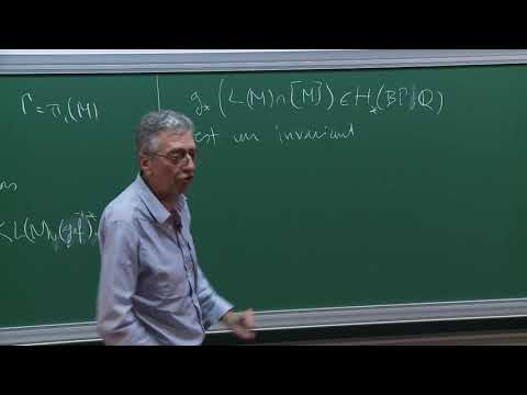 K-théorie à coefficients réels et une conjecture de Baum-Connes localisée à l'élément neutre
