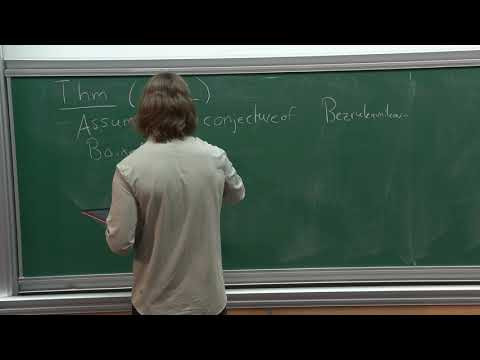 The Invariant Part of the Center of the Small Quantum Group