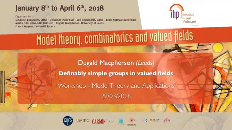 Definably simple groups in valued fields