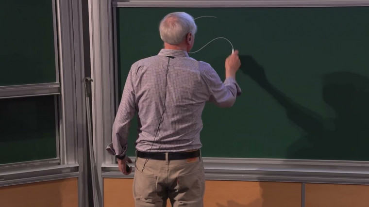 Minimal Surfaces Defined by Extremal Eigenvalue Problems